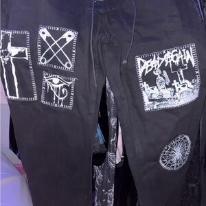 Dolls Kill Black Patchwork Graphic Pants with White Prints